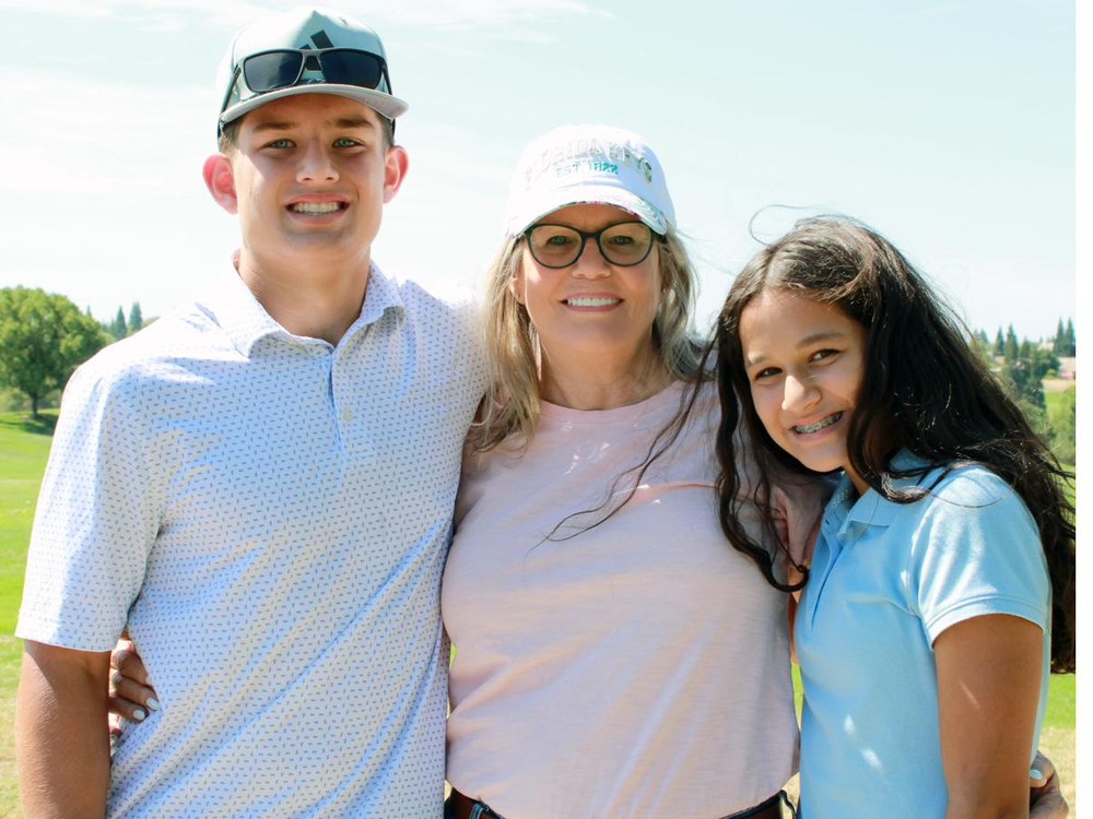 Michelle Kubo with her grandchildren
